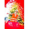 Young female driver wearing a high visibility vest on the roadside after her car has broken down
