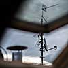 Antennas and a satellite dish on a roof