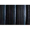 Stack of brand new high performance car tires on clean high-key white studio background