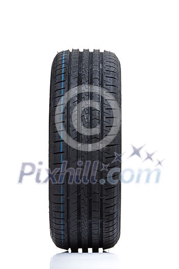 Stack of brand new high performance car tires on clean high-key white studio background Stack of brand new high performance car tires on clean high-key white studio background