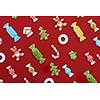 Christmas background. Homemade delicious Christmas gingerbread cookies on a red background.