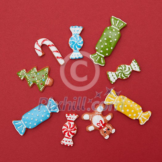 Frame of Christmas cookies on a red background with space for text Frame of Christmas cookies on a red background with space for text