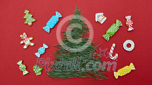 Christmas card with pine needles and Christmas cookies Christmas card with pine needles and Christmas cookies
