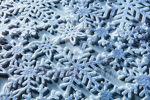 Blue and white snowflakes on a blue and white background Blue and white snowflakes on a blue and white background