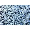 Blue and white snowflakes on a blue and white background