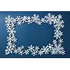 Blue background with space for text and snowflakes.