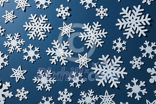 Winter, Christmas or New Years blue background with snowflakes Winter, Christmas or New Years blue background with snowflakes