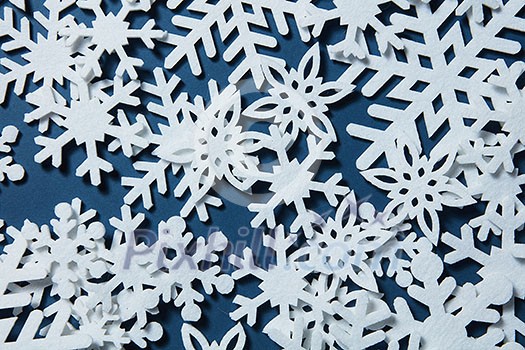 Snowflakes on a blue background. Christmas winter background Snowflakes on a blue background. Christmas winter background