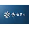 snowflakes of different sizes on a blue background