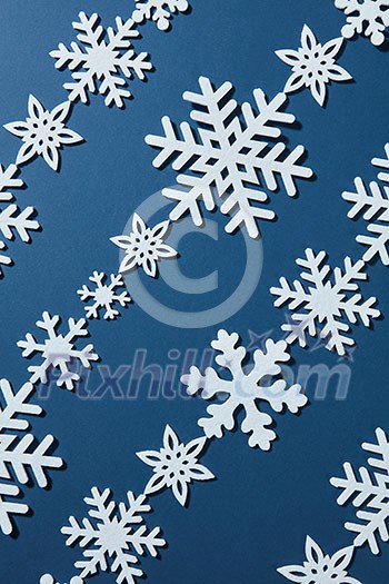 Christmas background of snowflakes on a blue background Christmas background of snowflakes on a blue background