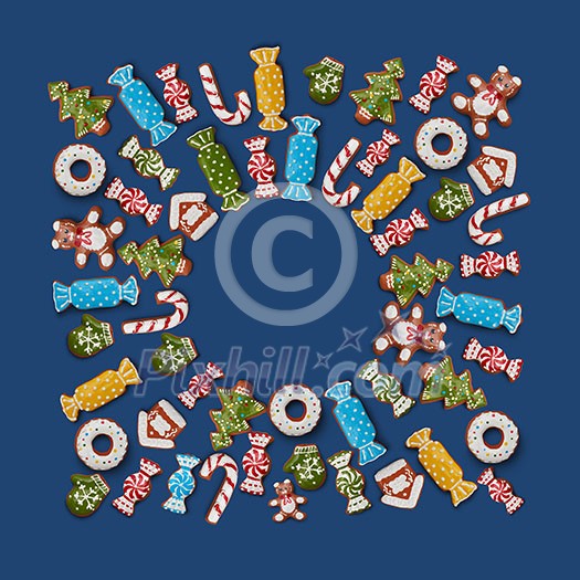 Christmas Frame of gingerbread cookies on a blue background Christmas Frame of gingerbread cookies on a blue background