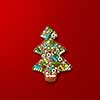 Christmas tree from ginger cookies with decorations on red background