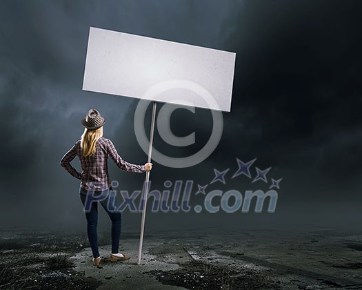 Young girl in casual with white banner. Place for text