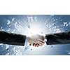 Close up of businessman hands making deal