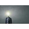 Idea concept with businessman and light bulb instead of his head