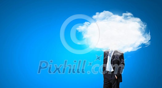 Businessman standing with his head in cloud Businessman standing with his head in cloud