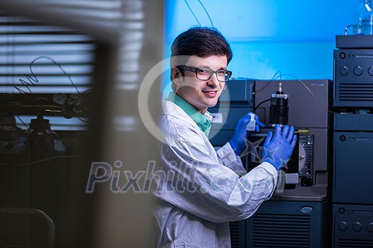 Senior male researcher carrying out scientific research in a lab (shallow DOF; color toned image) Senior male researcher carrying out scientific research in a lab (shallow DOF; color toned image)
