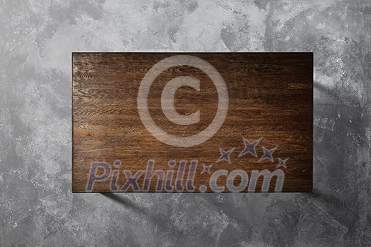 top view of a brown wooden table on a concrete background flat lay top view of a brown wooden table on a concrete background flat lay
