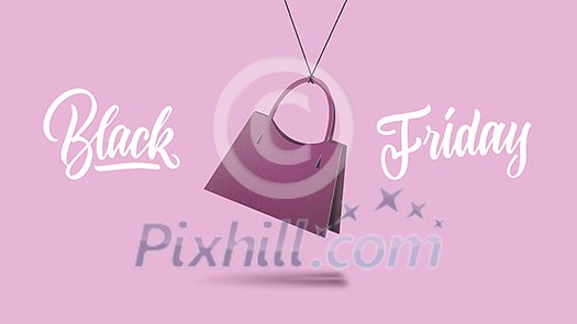 a label in shape of the classic womens handbag made of cardboard on a purple background. calligraphic text is black Friday. The concept of sales a label in shape of the classic womens handbag made of cardboard on a purple background. calligraphic text is black Friday. The concept of sales