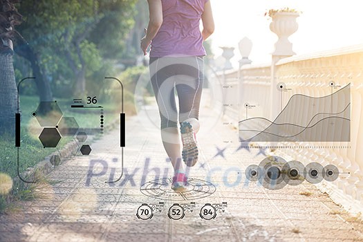 Fitness woman training and jogging in summer park, close up on running legs Fitness woman training and jogging in summer park, close up on running legs