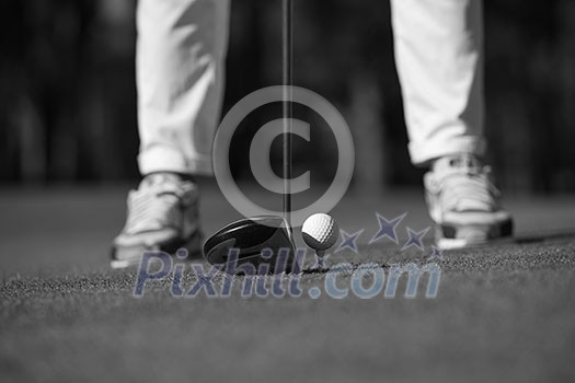 golf player hitting shot with club on course at beautiful morning golf player hitting shot with club on course at beautiful morning
