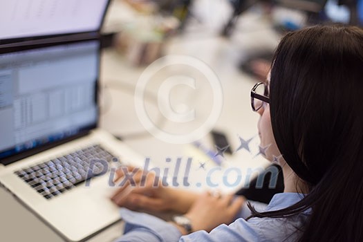 software developer writing programming code on laptop computer software developer writing programming code on laptop computer