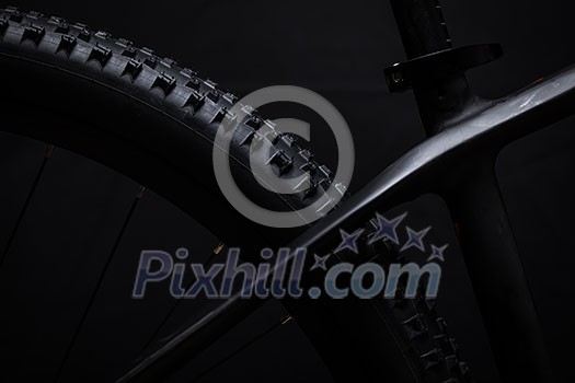 Modern MTB race mountain bike isolated on black background in a studio