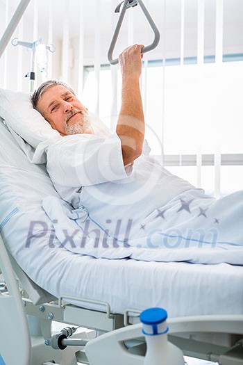Senior male patient in a modern hospital (shallow DOF; color toned image) Senior male patient in a modern hospital (shallow DOF; color toned image)