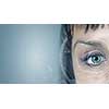 Close up of woman eye in process of scanning