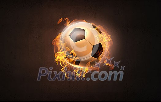 Conceptual image of football ball in fire flames