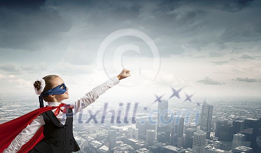 Girl of school age in super hero costume Girl of school age in super hero costume