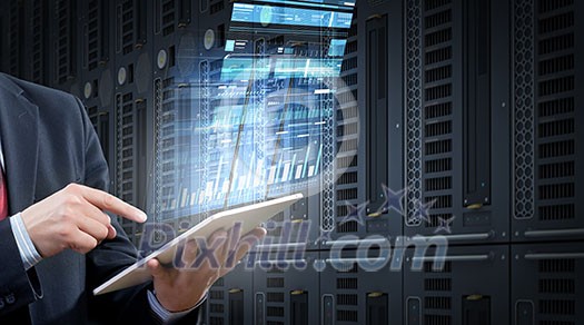 Businessman using tablet over virtual interface background Businessman using tablet over virtual interface background