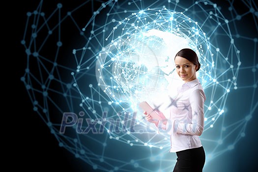 Businesswoman with tablet pc against high tech blue background Businesswoman with tablet pc against high tech blue background