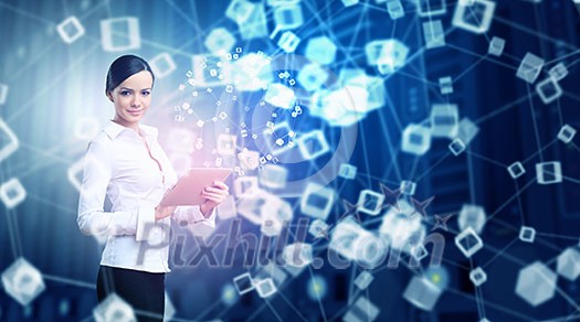 Businesswoman with tablet pc against high tech blue background Businesswoman with tablet pc against high tech blue background