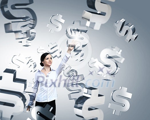Attractive businesswoman pushing dollar icon on media screen Attractive businesswoman pushing dollar icon on media screen