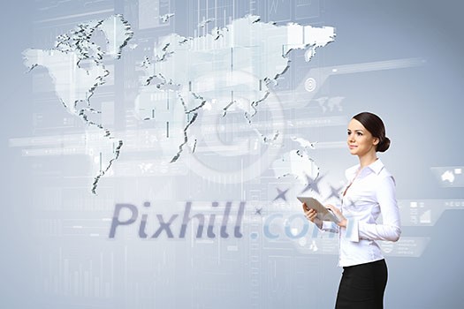 Businesswoman with tablet pc against high tech blue background Businesswoman with tablet pc against high tech blue background