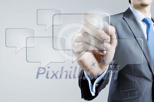 Businessman drawing with marker speech bubble on screen Businessman drawing with marker speech bubble on screen