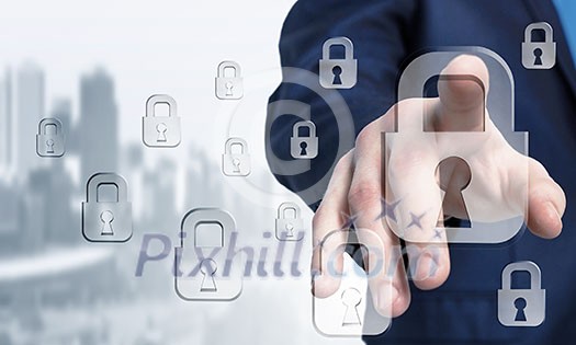 Hand of businessman touching lock icon on digital screen Hand of businessman touching lock icon on digital screen
