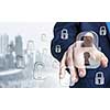 Hand of businessman touching lock icon on digital screen