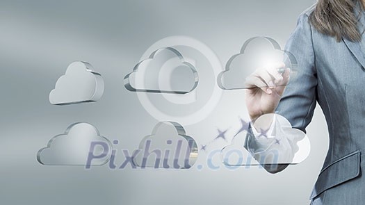 Businesswoman pushing with stylus glass cloud icon on screen Businesswoman pushing with stylus glass cloud icon on screen