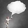 Pretty businesswoman spraying white speech cloud from container
