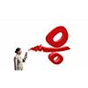 Young businesswoman with suitcase using spray balloon