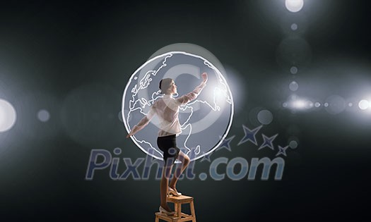 Businesswoman standing on chair and reaching travel concept Businesswoman standing on chair and reaching travel concept