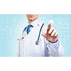 Unrecognizable male doctor with stethoscope working with virtual screen panel