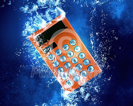 Calculator item sink in clear blue water Calculator item sink in clear blue water