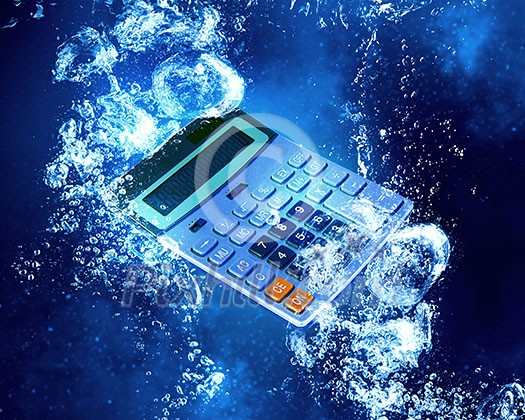 Calculator item sink in clear blue water Calculator item sink in clear blue water