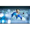 Senior male researcher carrying out scientific research in a lab (shallow DOF; color toned image)