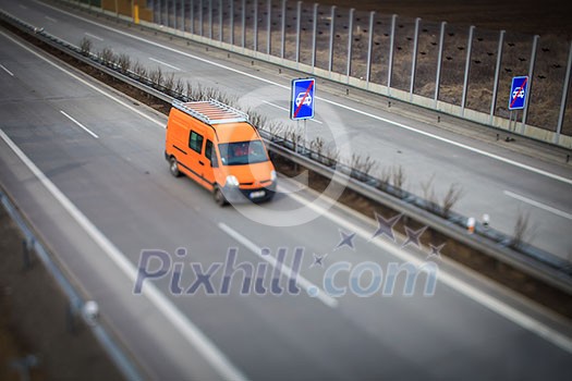 Highway traffic - motion blurred cars on a highway Highway traffic - motion blurred cars on a highway