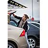 Pretty young female passenger at the airport (shallow DOF; color toned image)