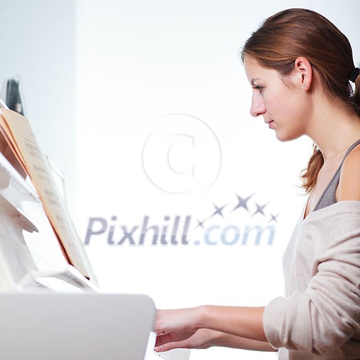 Playing Piano (shallow DOF; color toned image)